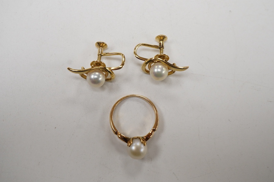 A pair of Mikimoto 14k yellow metal and single stone cultured pearl set ear clips, 17mm, together with a 14k yellow metal and single stone cultured pearl set ring.